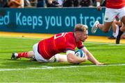 25 September 2022; Ben Heale of Munster dives to score his side's second try during the United Rugby Championship match between Dragons and Munster at Rodney Parade in Newport, Wales. Photo by Mark Lewis/Sportsfile