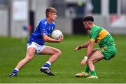 25 September 2022; Harry Plunkett of Tullamore in action against Ruairí McNamee of Rhode during the Offaly County Senior Football Championship Final match between Tullamore and Rhode at O'Connor Park in Tullamore, Offaly. Photo by Ben McShane/Sportsfile