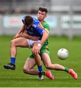 25 September 2022; Luke Plunkett of Tullamore in action against Conor McNamee of Rhode during the Offaly County Senior Football Championship Final match between Tullamore and Rhode at O'Connor Park in Tullamore, Offaly. Photo by Ben McShane/Sportsfile
