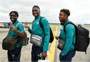 25 September 2022; Republic of Ireland players, from left, Festy Ebosele, Joshua Kayode and David Odomosu at Dublin Airport ahead of the team's chartered flight to Tel Aviv for their UEFA European U21 Championship Play-Off Second Leg match against Israel in Tel Aviv on Tuesday next. Photo by Seb Daly/Sportsfile