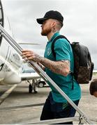 25 September 2022; Aaron Connolly of Republic of Ireland at Dublin Airport ahead of the team's chartered flight to Tel Aviv for their UEFA European U21 Championship Play-Off Second Leg match against Israel in Tel Aviv on Tuesday next. Photo by Seb Daly/Sportsfile