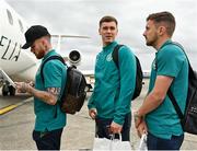 25 September 2022; Republic of Ireland players, from left, Aaron Connolly, Brian Maher and Lee O'Connor at Dublin Airport ahead of the team's chartered flight to Tel Aviv for their UEFA European U21 Championship Play-Off Second Leg match against Israel in Tel Aviv on Tuesday next. Photo by Seb Daly/Sportsfile