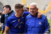 25 September 2022; St Finbarr's manager Ger Cunningham, right, and his son Ben Cunningham of St Finbarr's after their side's victory in the Cork County Premier Senior Club Hurling Championship Semi-Final match between St Finbarr's and Newtownshandrum at Páirc Ui Chaoimh in Cork. Photo by Sam Barnes/Sportsfile