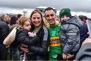 25 September 2022; Ciarán Heavey of Rhode celebrates with his family, from left, daughter Millie, wife Lorna and son Jack after the Offaly County Senior Football Championship Final match between Tullamore and Rhode at O'Connor Park in Tullamore, Offaly. Photo by Ben McShane/Sportsfile