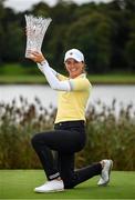 25 September 2022; Klara Spilkova of Czech Republic celebrates with the trophy after winning on the first play-off hole during round four of the KPMG Women's Irish Open Golf Championship at Dromoland Castle in Clare. Photo by Brendan Moran/Sportsfile