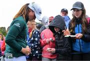 25 September 2022; Leona Maguire of Ireland signs autographs for spectators after finishing her round during round four of the KPMG Women's Irish Open Golf Championship at Dromoland Castle in Clare. Photo by Brendan Moran/Sportsfile