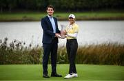 25 September 2022; Klara Spilkova of Czech Republic is presented with the trophy by Minister of State for Sport and the Gaeltacht Jack Chambers TD after round four of the KPMG Women's Irish Open Golf Championship at Dromoland Castle in Clare. Photo by Brendan Moran/Sportsfile