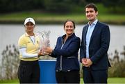 25 September 2022; Klara Spilkova of Czech Republic is presented with the trophy by Minister for Media, Tourism, Arts, Culture, Sport and the Gaeltacht, Catherine Martin TD, in the company of Minister of State for Sport and the Gaeltacht Jack Chambers TD, after round four of the KPMG Women's Irish Open Golf Championship at Dromoland Castle in Clare. Photo by Brendan Moran/Sportsfile