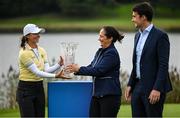 25 September 2022; Klara Spilkova of Czech Republic is presented with the trophy by Minister for Media, Tourism, Arts, Culture, Sport and the Gaeltacht, Catherine Martin TD, in the company of Minister of State for Sport and the Gaeltacht Jack Chambers TD, after round four of the KPMG Women's Irish Open Golf Championship at Dromoland Castle in Clare. Photo by Brendan Moran/Sportsfile