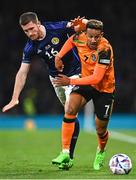 24 September 2022; Callum Robinson of Republic of Ireland in action against Anthony Ralston of Scotland during UEFA Nations League B Group 1 match between Scotland and Republic of Ireland at Hampden Park in Glasgow, Scotland. Photo by Eóin Noonan/Sportsfile