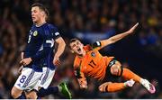 24 September 2022; Jason Knight of Republic of Ireland reacts to being tackled during UEFA Nations League B Group 1 match between Scotland and Republic of Ireland at Hampden Park in Glasgow, Scotland. Photo by Eóin Noonan/Sportsfile