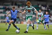 26 September 2022; Rory Gaffney of Shamrock Rovers in action against Alex Dunne of UCD during the SSE Airtricity League Premier Division match between Shamrock Rovers and UCD at Tallaght Stadium in Dublin. Photo by Ben McShane/Sportsfile