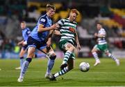 26 September 2022; Rory Gaffney of Shamrock Rovers in action against Sam Todd of UCD during the SSE Airtricity League Premier Division match between Shamrock Rovers and UCD at Tallaght Stadium in Dublin. Photo by Ben McShane/Sportsfile