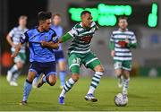 26 September 2022; Graham Burke of Shamrock Rovers in action against Sean Brennan of UCD during the SSE Airtricity League Premier Division match between Shamrock Rovers and UCD at Tallaght Stadium in Dublin. Photo by Ben McShane/Sportsfile