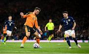 24 September 2022; Troy Parrott of Republic of Ireland in action against Greg Taylor of Scotland during UEFA Nations League B Group 1 match between Scotland and Republic of Ireland at Hampden Park in Glasgow, Scotland. Photo by Stephen McCarthy/Sportsfile