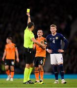 24 September 2022; Josh Cullen of Republic of Ireland is shown a yellow card by referee Sandro Schärer during UEFA Nations League B Group 1 match between Scotland and Republic of Ireland at Hampden Park in Glasgow, Scotland. Photo by Stephen McCarthy/Sportsfile