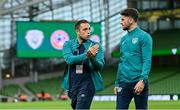 27 September 2022; Republic of Ireland coach Stephen Rice and Robbie Brady, right, before the UEFA Nations League B Group 1 match between Republic of Ireland and Armenia at Aviva Stadium in Dublin. Photo by Ramsey Cardy/Sportsfile