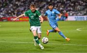 27 September 2022; Ross Tierney of Republic of Ireland in action against Ziv Morgan of Israel during the UEFA European U21 Championship play-off second leg match between Israel and Republic of Ireland at Bloomfield Stadium in Tel Aviv, Israel. Photo by Seb Daly/Sportsfile