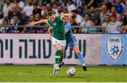 27 September 2022; Ross Tierney of Republic of Ireland is fouled by Ido Shahar of Israel during the UEFA European U21 Championship play-off second leg match between Israel and Republic of Ireland at Bloomfield Stadium in Tel Aviv, Israel. Photo by Seb Daly/Sportsfile