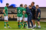 27 September 2022; Republic of Ireland manager Jim Crawford speaks to captain Conor Coventry and teammates during the UEFA European U21 Championship play-off second leg match between Israel and Republic of Ireland at Bloomfield Stadium in Tel Aviv, Israel. Photo by Seb Daly/Sportsfile