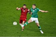 27 September 2022; Tigran Barseghyan in action against Dara O'Shea of Republic of Ireland during the UEFA Nations League B Group 1 match between Republic of Ireland and Armenia at Aviva Stadium in Dublin. Photo by Sam Barnes/Sportsfile