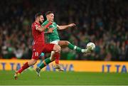 27 September 2022; Dara O'Shea of Republic of Ireland in action against Tigran Barseghyan of Armenia during the UEFA Nations League B Group 1 match between Republic of Ireland and Armenia at Aviva Stadium in Dublin. Photo by Ben McShane/Sportsfile