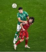 27 September 2022; John Egan of Republic of Ireland in action against Khoren Bayramyan of Armenia during the UEFA Nations League B Group 1 match between Republic of Ireland and Armenia at Aviva Stadium in Dublin. Photo by Sam Barnes/Sportsfile