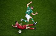 27 September 2022; Nathan Collins of Republic of Ireland is tackled by Andre Calisir of Armenia during the UEFA Nations League B Group 1 match between Republic of Ireland and Armenia at Aviva Stadium in Dublin. Photo by Sam Barnes/Sportsfile