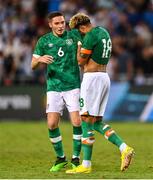 27 September 2022; Tyreik Wright, right, is consoled by teammate Conor Coventry of Republic of Ireland after missing a kick in a penalty shoot out after the UEFA European U21 Championship play-off second leg match between Israel and Republic of Ireland at Bloomfield Stadium in Tel Aviv, Israel. Photo by Seb Daly/Sportsfile
