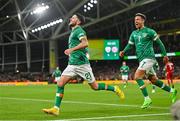 27 September 2022; Robbie Brady of Republic of Ireland celebrates after scoring his side's third goal with team-mate Callum Robinson, right, during the UEFA Nations League B Group 1 match between Republic of Ireland and Armenia at Aviva Stadium in Dublin. Photo by Ramsey Cardy/Sportsfile