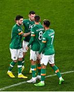 27 September 2022; Robbie Brady of Republic of Ireland, left, celebrates with teammates Alan Browne, Conor Hourihane and Callum Robinson after the UEFA Nations League B Group 1 match between Republic of Ireland and Armenia at Aviva Stadium in Dublin. Photo by Sam Barnes/Sportsfile
