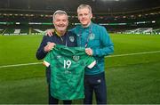 27 September 2022; Republic of Ireland team doctor Alan Byrne, who presided over his last game for the team, is presented with a jersey by team chef David Steele after the UEFA Nations League B Group 1 match between Republic of Ireland and Armenia at Aviva Stadium in Dublin. Photo by Ramsey Cardy/Sportsfile