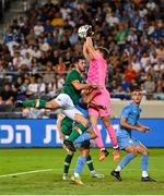 27 September 2022; Eiran Cashin of Republic of Ireland in action against Israel goalkeeper Daniel Peretz during the UEFA European U21 Championship play-off second leg match between Israel and Republic of Ireland at Bloomfield Stadium in Tel Aviv, Israel. Photo by Seb Daly/Sportsfile