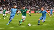 27 September 2022; Andy Lyons of Republic of Ireland in action against Eden Karzev, left, and Ido Shahar of Israel during the UEFA European U21 Championship play-off second leg match between Israel and Republic of Ireland at Bloomfield Stadium in Tel Aviv, Israel. Photo by Seb Daly/Sportsfile