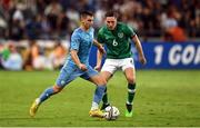 27 September 2022; Oscar Gloukh of Israel in action against Conor Coventry of Republic of Ireland during the UEFA European U21 Championship play-off second leg match between Israel and Republic of Ireland at Bloomfield Stadium in Tel Aviv, Israel. Photo by Seb Daly/Sportsfile