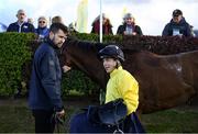 28 September 2022; Tyrone footballer and groom Conor McKenna, son of trainer Patrick McKenna, with jockey Wayne Lordan after sending out No Speed Limit in the Colm Quinn BMW Handicap at Bellewstown Racecourse in Meath. Photo by Harry Murphy/Sportsfile