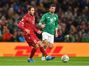 27 September 2022; Hrayr Mkoyan of Armenia and Troy Parrott of Republic of Ireland during the UEFA Nations League B Group 1 match between Republic of Ireland and Armenia at Aviva Stadium in Dublin. Photo by Ben McShane/Sportsfile