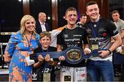 24 September 2022; Eric Donovan, with wife Laura, and sons Jake and Troy, after defeating Khalil El Hadri in their EBU European Union super-featherweight bout at the Europa Hotel in Belfast. Photo by Ramsey Cardy/Sportsfile