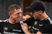 24 September 2022; Eric Donovan, left, with his trainer Packie Collins, after his EBU European Union super-featherweight bout against Khalil El Hadri at the Europa Hotel in Belfast. Photo by Ramsey Cardy/Sportsfile