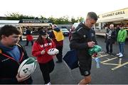 30 September 2022; Jonathan Sexton of Leinster signs an autograph for Ryan McLaughlin, age 12, from Ballymoney before the United Rugby Championship match between Ulster and Leinster at Kingspan Stadium in Belfast.  Photo by David Fitzgerald/Sportsfile