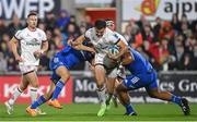 30 September 2022; Jacob Stockdale of Ulster is tackled by Jordan Larmour, left and Michael Ala'alatoa of Leinster during the United Rugby Championship match between Ulster and Leinster at Kingspan Stadium in Belfast. Photo by Ramsey Cardy/Sportsfile
