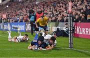 30 September 2022; Ryan Baird of Leinster scores his side's first try despite the tackle of Billy Burns of Ulster during the United Rugby Championship match between Ulster and Leinster at Kingspan Stadium in Belfast. Photo by David Fitzgerald/Sportsfile