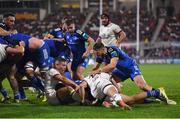 30 September 2022; Dan Sheehan of Leinster goes over to scores his side's second try despite the tackle of John Cooney of Ulster during the United Rugby Championship match between Ulster and Leinster at Kingspan Stadium in Belfast. Photo by David Fitzgerald/Sportsfile