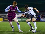 30 September 2022; Ryan O'Kane of Dundalk in action against Darragh Nugent of Drogheda United during the SSE Airtricity League Premier Division match between Dundalk and Drogheda United at Casey's Field in Dundalk, Louth. Photo by Ben McShane/Sportsfile