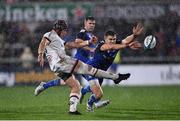 30 September 2022; Luke Marshall of Ulster kicks downfield despite the efforts of Garry Ringrose of Leinster during the United Rugby Championship match between Ulster and Leinster at Kingspan Stadium in Belfast. Photo by David Fitzgerald/Sportsfile