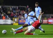 30 September 2022; Sadou Diallo of Derry City is tackled by Jamie Lennon of St Patrick's Athletic during the SSE Airtricity League Premier Division match between St Patrick's Athletic and Derry City at Richmond Park in Dublin. Photo by Eóin Noonan/Sportsfile