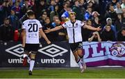 30 September 2022; Dundalk players Greg Sloggett, right, and Joe Adams celebrate their side's second goal, an own goal scored by Dane Massey of Drogheda United, not pictured, during the SSE Airtricity League Premier Division match between Dundalk and Drogheda United at Casey's Field in Dundalk, Louth. Photo by Ben McShane/Sportsfile
