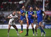 30 September 2022; Jordan Larmour of Leinster attempts to gather possession under pressure from Billy Burns of Ulster during the United Rugby Championship match between Ulster and Leinster at Kingspan Stadium in Belfast. Photo by David Fitzgerald/Sportsfile