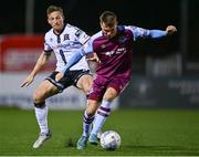 30 September 2022; Dayle Rooney of Drogheda United in action against John Mountney of Dundalk during the SSE Airtricity League Premier Division match between Dundalk and Drogheda United at Casey's Field in Dundalk, Louth. Photo by Ben McShane/Sportsfile