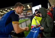 30 September 2022; Josh van der Flier of Leinster signs an autograph after the United Rugby Championship match between Ulster and Leinster at Kingspan Stadium in Belfast. Photo by Ramsey Cardy/Sportsfile